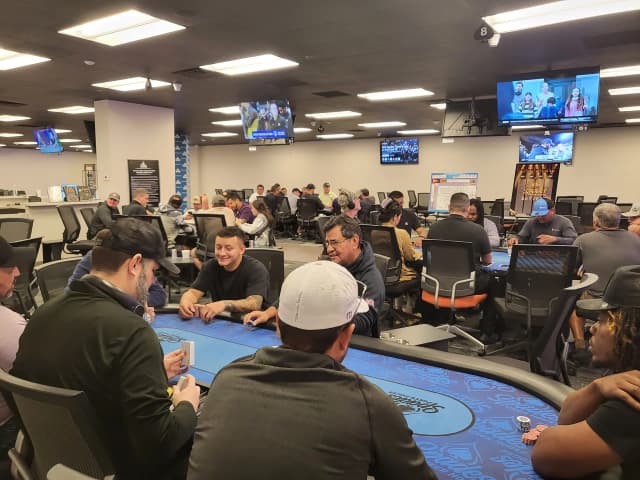 Spades Baytown poker room full of players in live action